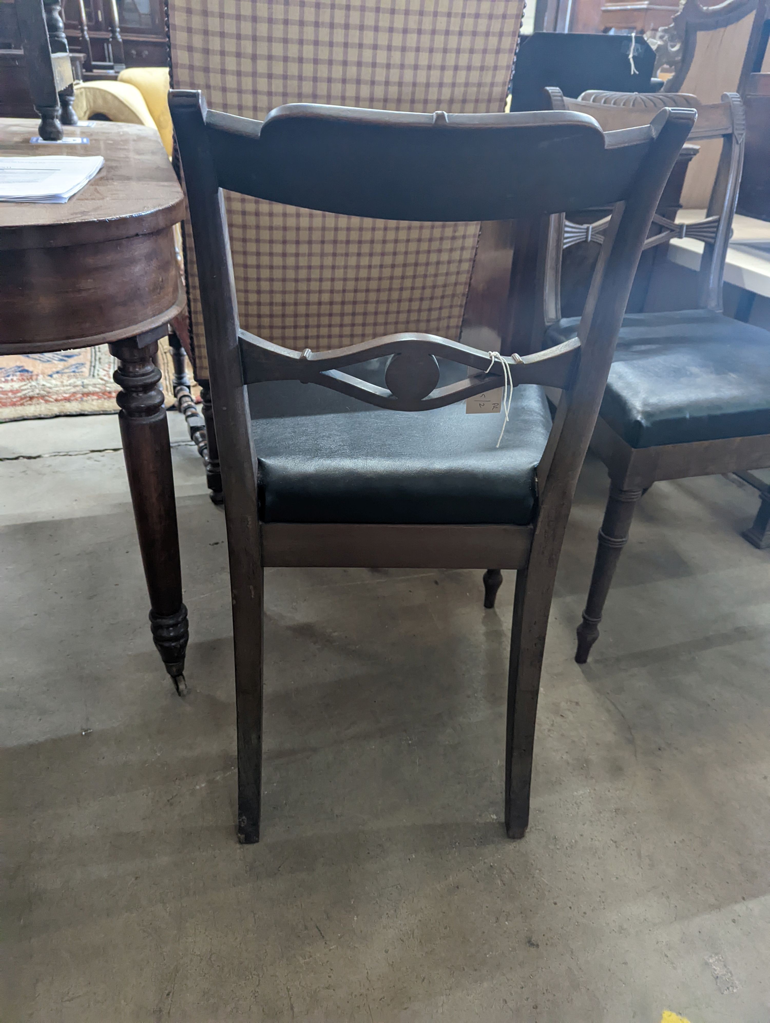 A pair of Regency mahogany dining chairs
